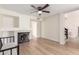 Spacious living room with a fireplace and neutral color palette at 7702 W Piute Ave, Glendale, AZ 85308