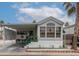 Charming home with a covered carport, landscaped yard, and welcoming curb appeal at 838 Aquamarine Dr, Apache Junction, AZ 85119