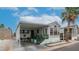 Charming home with a covered carport, landscaped yard, and welcoming curb appeal at 838 Aquamarine Dr, Apache Junction, AZ 85119