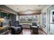 Bright living area with a window seat and large windows that provide natural light and views of the community at 838 Aquamarine Dr, Apache Junction, AZ 85119