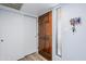 Practical entryway featuring closet, key rack, and natural light, combining functionality and style at 9275 E Mission Ln # 206, Scottsdale, AZ 85258