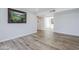 Bright living room with laminate flooring, a view of the adjacent spaces and ample natural light at 9275 E Mission Ln # 206, Scottsdale, AZ 85258