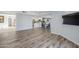 Inviting living room with open layout, laminate flooring and access to the dining and kitchen areas at 9275 E Mission Ln # 206, Scottsdale, AZ 85258