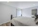 Cozy primary bedroom featuring neutral tones and soft lighting provides a restful and inviting ambiance at 9275 E Mission Ln # 206, Scottsdale, AZ 85258