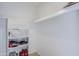 Bright walk-in closet features built-in shelving for optimal storage solutions at 9275 E Mission Ln # 206, Scottsdale, AZ 85258