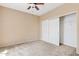 Bedroom featuring a ceiling fan and closet with sliding doors for storage at 10136 E Southern Ave # 1052, Mesa, AZ 85209