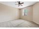 Bedroom featuring carpeted flooring and a window view at 10136 E Southern Ave # 1052, Mesa, AZ 85209