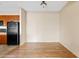 Dining room with wood flooring and kitchen access at 10136 E Southern Ave # 1052, Mesa, AZ 85209