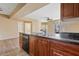 Kitchen sink with a view of the open concept living room at 10136 E Southern Ave # 1052, Mesa, AZ 85209