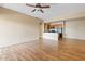 Open concept living room and kitchen with wood flooring at 10136 E Southern Ave # 1052, Mesa, AZ 85209