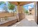 Inviting covered patio with neutral flooring and partial wall, perfect for enjoying the outdoor view at 10136 E Southern Ave # 1052, Mesa, AZ 85209
