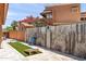 The property showcases artificial turf, cornhole boards, and a mural on the back wall at 10838 N 10Th St, Phoenix, AZ 85020