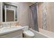 Bathroom featuring a single vanity, modern fixtures, and shower over tub at 10838 N 10Th St, Phoenix, AZ 85020