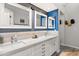 Bathroom featuring double vanity, modern fixtures, and decorative mirrors at 10838 N 10Th St, Phoenix, AZ 85020
