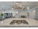 Well-appointed kitchen with a large island, stainless steel appliances, and an open layout to the living spaces at 116 E Santa Lucia Ln, Queen Creek, AZ 85140