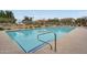 Large community pool is surrounded by lounge seating and a covered picnic area for an upscale resort feel at 11875 W Lone Tree Trl, Peoria, AZ 85383