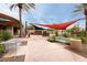 Inviting community space with shade structures, seating, and water features for relaxation at 11875 W Lone Tree Trl, Peoria, AZ 85383