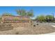 Stone sign reading Chaparral Canyon, marking the entrance of a beautiful community at 11875 W Lone Tree Trl, Peoria, AZ 85383