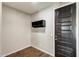 Practical entryway features a coat rack and a dark-colored door, perfect for keeping organized and welcoming guests at 11875 W Lone Tree Trl, Peoria, AZ 85383