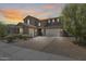 Spacious two-story home with three-car garage and inviting curb appeal at 11875 W Lone Tree Trl, Peoria, AZ 85383