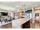 Gourmet kitchen with a large island, stainless steel appliances, and open layout at 11875 W Lone Tree Trl, Peoria, AZ 85383