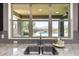 Modern kitchen sink overlooking the backyard swimming pool and landscaped yard at 11875 W Lone Tree Trl, Peoria, AZ 85383