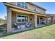 Covered patio with comfortable seating area, perfect for outdoor entertaining at 11875 W Lone Tree Trl, Peoria, AZ 85383