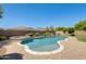 Inviting pool area with lush landscaping and comfortable seating, perfect for relaxing and enjoying the outdoors at 11875 W Lone Tree Trl, Peoria, AZ 85383