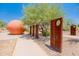 Outdoor sculpture exhibit beside the sidewalk providing a cultural and artistic attraction at 11875 W Lone Tree Trl, Peoria, AZ 85383