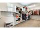 Spacious walk-in closet with built-in shelving and hanging racks for optimal organization at 11875 W Lone Tree Trl, Peoria, AZ 85383