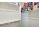 Spacious walk-in closet with shelving, hanging rods, and a display of memorabilia at 11875 W Lone Tree Trl, Peoria, AZ 85383