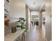Inviting hallway leading to a bright living area with mountain views at 12027 S 183Rd Dr, Goodyear, AZ 85338