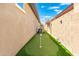 Backyard putting green provides a fun recreational amenity at 12027 S 183Rd Dr, Goodyear, AZ 85338