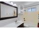 Functional bathroom with white countertop, large mirror, and shower-tub combination at 1215 E Geneva Dr, Tempe, AZ 85282