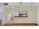 The kitchen features ample cabinet space and stylish pendant lighting at 1215 E Geneva Dr, Tempe, AZ 85282