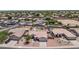 Aerial view of a suburban community featuring similar homes, landscaping, and desert landscaping at 15019 W Banff Ln, Surprise, AZ 85379