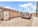 Functional backyard with a trailer and storage shed on gravel at 15019 W Banff Ln, Surprise, AZ 85379
