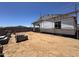 New home construction with scaffold and stacked concrete blocks in the back yard at 15793 W Beryl Ave, Waddell, AZ 85355