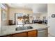Bright kitchen offering an open floor plan and outside views at 16222 W Silver Falls Dr, Surprise, AZ 85374