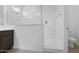 Bright bathroom showcasing a glass-enclosed shower and modern fixtures, perfect for a serene and clean aesthetic at 16784 W Hope Dr, Surprise, AZ 85388
