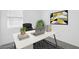 Stylish home office with modern decor, including a sleek desk, comfortable chair, and vibrant artwork, perfect for productivity at 16784 W Hope Dr, Surprise, AZ 85388