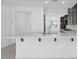 Spacious kitchen featuring white counters with dark accents and modern fixtures at 16784 W Hope Dr, Surprise, AZ 85388