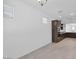 Open floor plan showcases a spacious area with a kitchen boasting dark wood cabinets and stainless steel appliances at 16784 W Hope Dr, Surprise, AZ 85388
