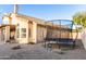 Backyard featuring a trampoline and covered patio at 19276 N 90Th Pl, Scottsdale, AZ 85255