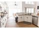 Well-lit kitchen with white cabinets, stainless steel appliances, and granite countertops at 19276 N 90Th Pl, Scottsdale, AZ 85255