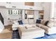 Open floor plan features living room with a bar area and comfortable seating at 19276 N 90Th Pl, Scottsdale, AZ 85255