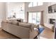 Open floor plan showcases bright living room with access to kitchen and outdoor space at 19276 N 90Th Pl, Scottsdale, AZ 85255