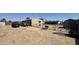 Backyard with desert landscaping, patio furniture, and chain link fencing at 20626 N 35Th Ave, Glendale, AZ 85308