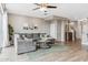 Spacious living room with a cozy sectional sofa and a view of the stairway at 2237 S Jacana Ln, Gilbert, AZ 85295