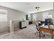 Upstairs living space featuring carpet, desk, TV and comfortable furniture at 2237 S Jacana Ln, Gilbert, AZ 85295